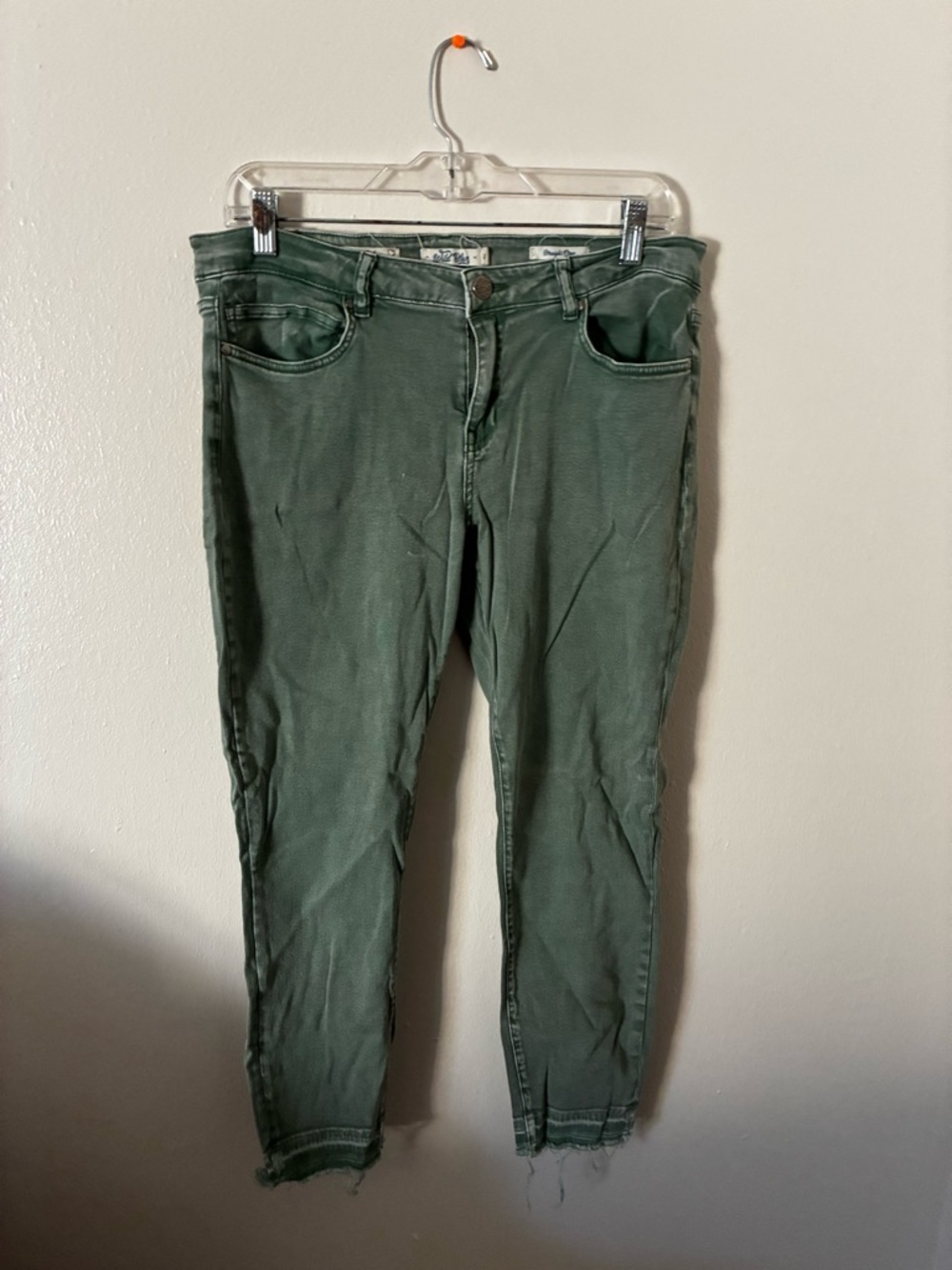 Women’s Olive Skinny Jeans with Frayed Hem